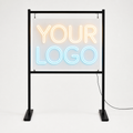 Custom LED neon sign product photo on clear acrylic with freestanding event display stand