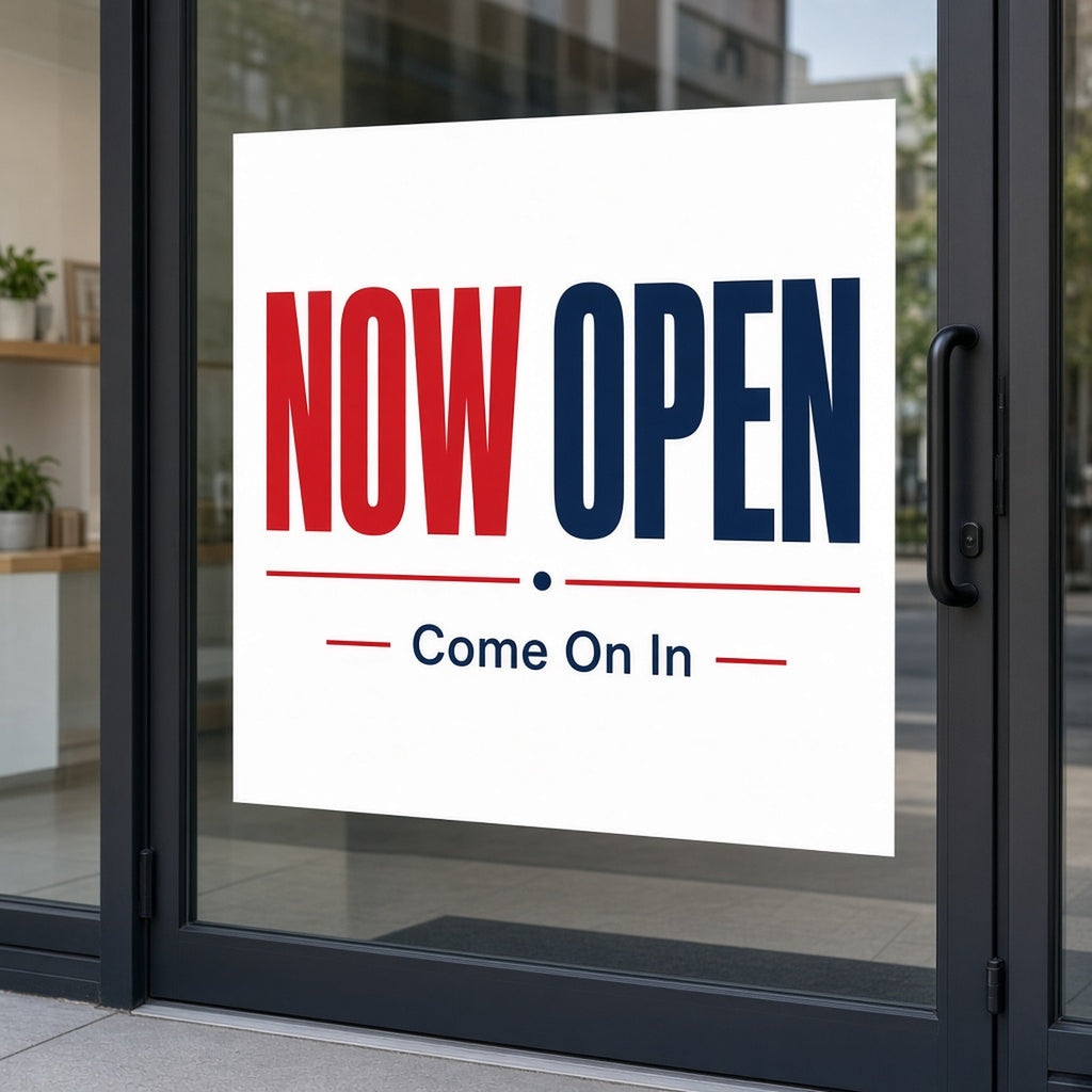 Opaque white window decal with a Now Open message on a glass shop door