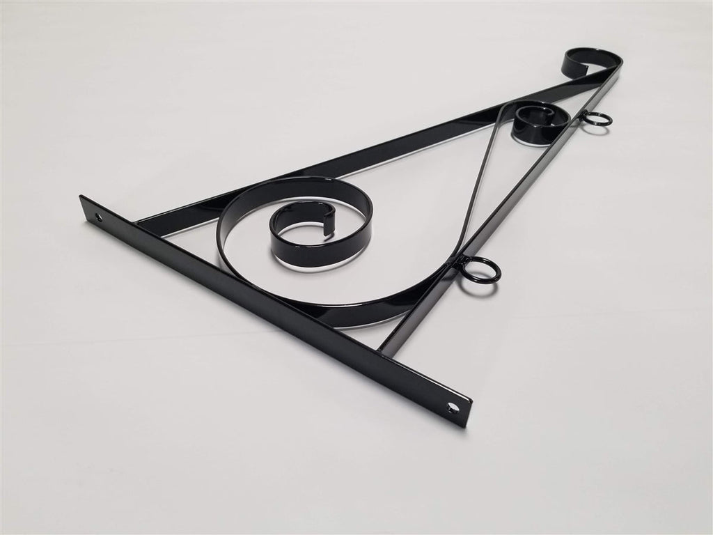 Scroll bracket mounted on a wall