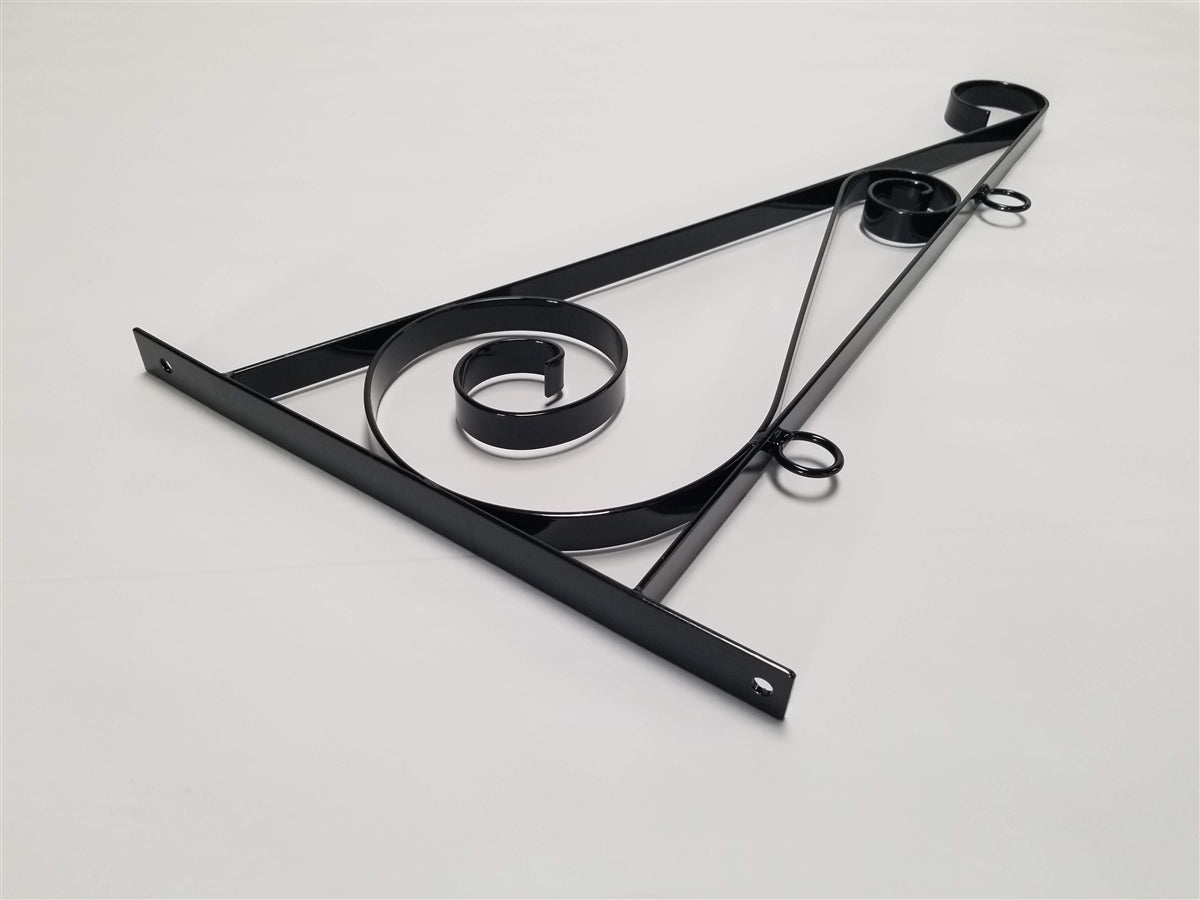 Scroll bracket mounted on a wall
