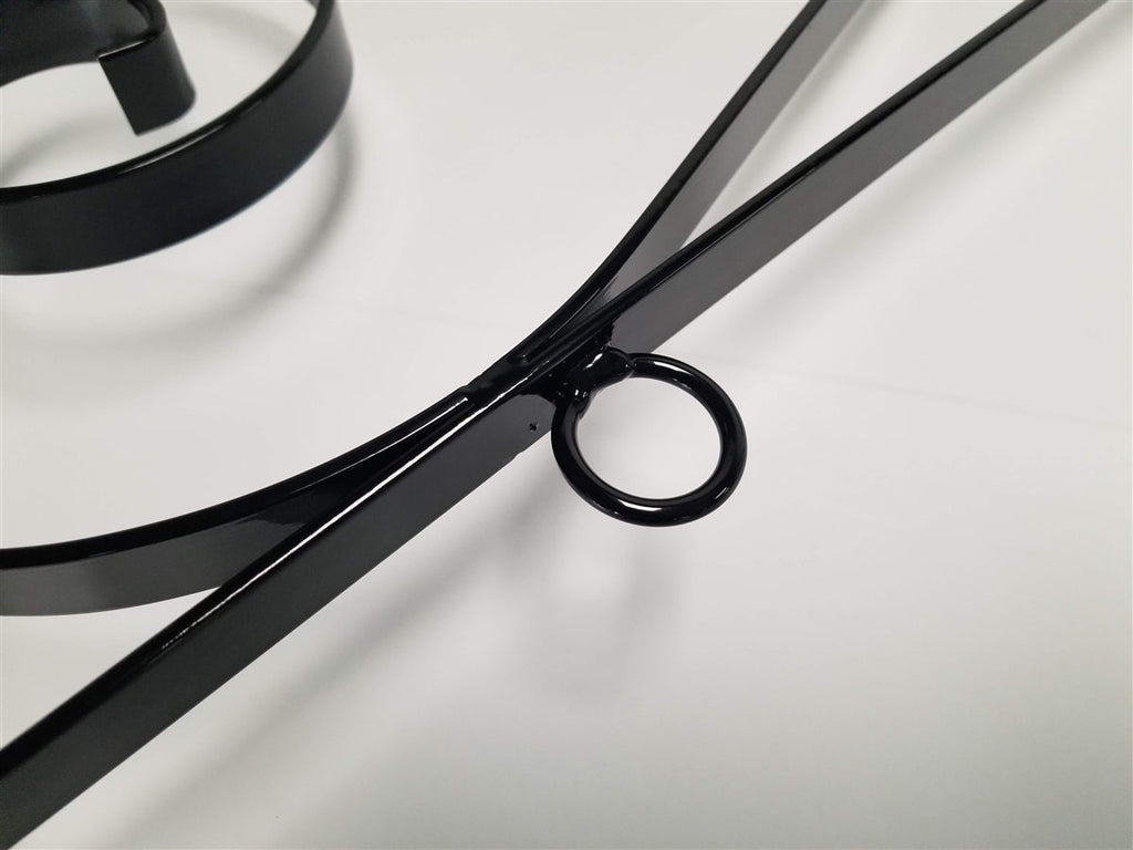 Scroll bracket ring and arm detail