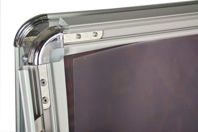 Snap-open frame corner on aluminum A-frame sidewalk sign
