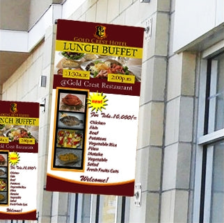Wall-mounted vertical banners on a storefront